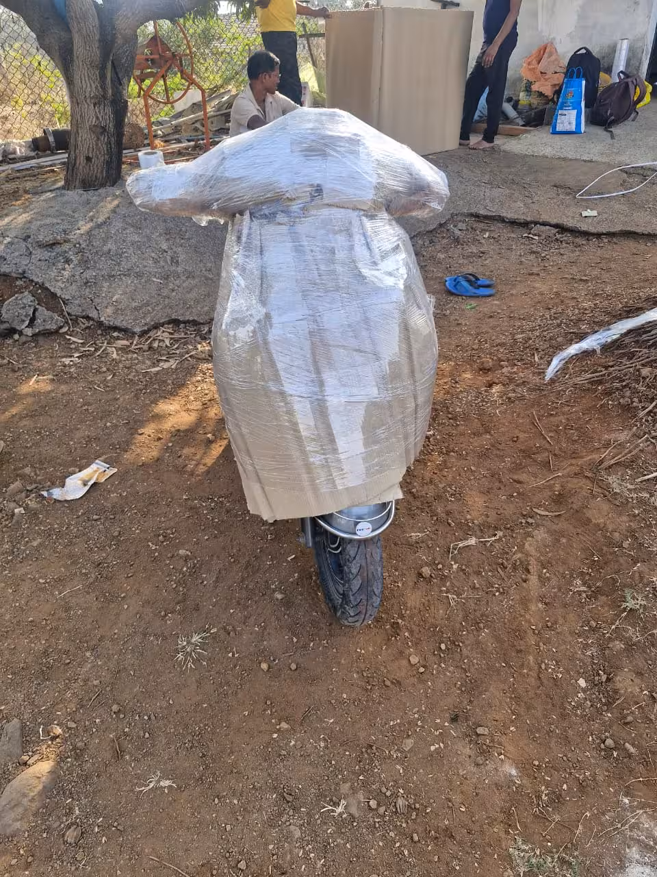 Secure multi-layer wrapping for safe bike and scooter transport.
