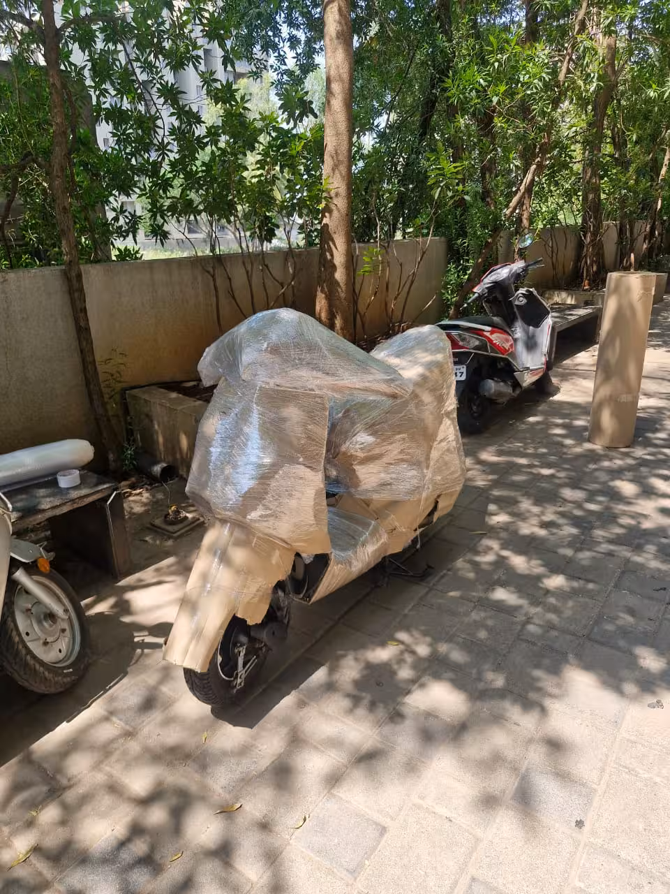 Professionally packed scooter ready for nationwide transportation.