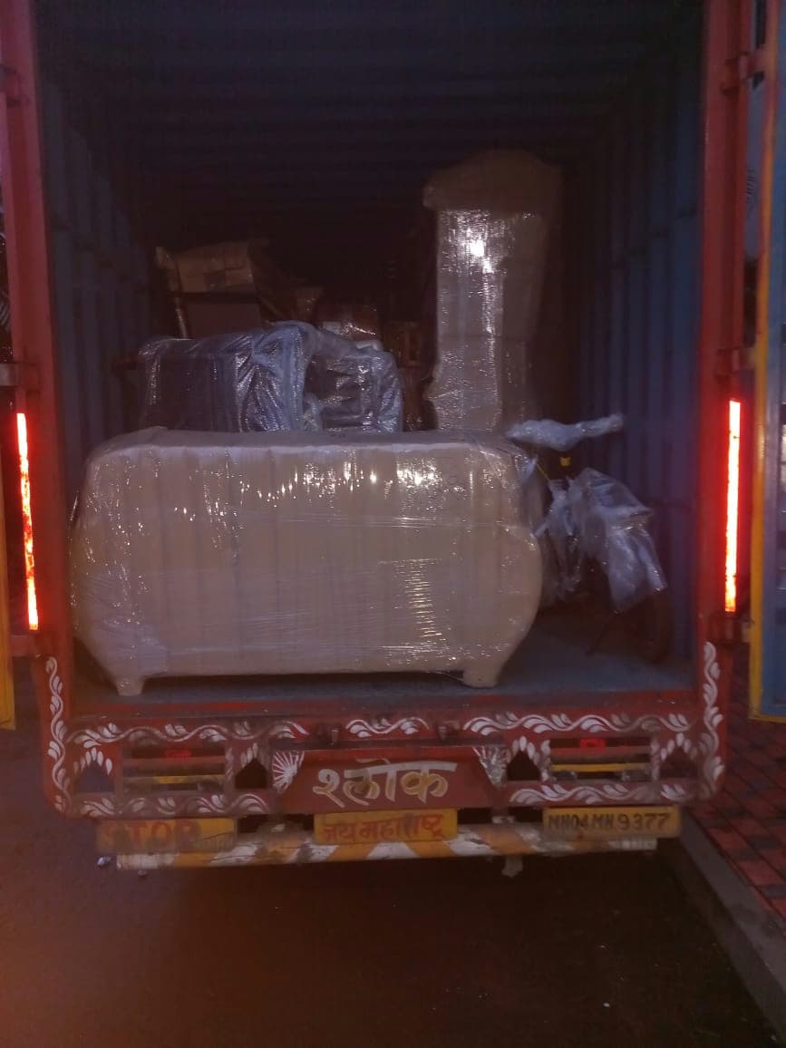 Secure nighttime relocation with professionally wrapped furniture loaded in our transport vehicle.