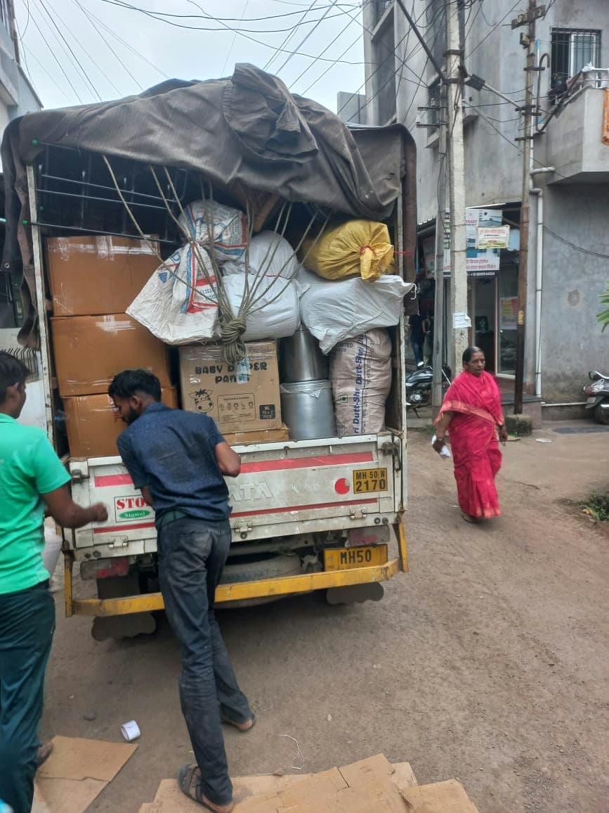Our moving crew managing the loading process on-site, ensuring everything is secure before transit.