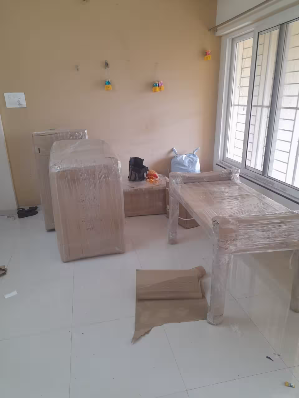 Complete home packing service with all household goods professionally wrapped.