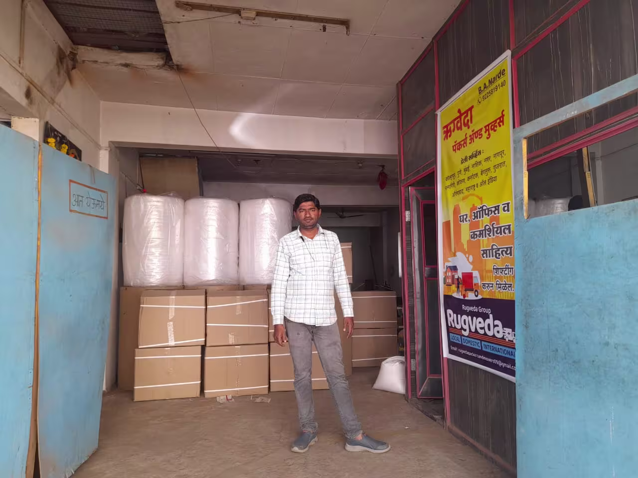 Rugveda Packers and Movers' secure storage facility with packed goods.