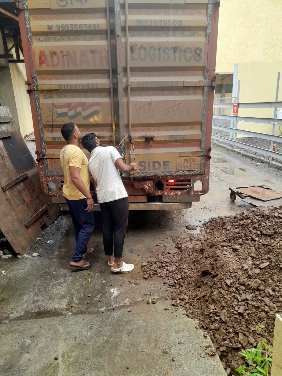 Our moving crew securing the transport truck after successfully loading all household goods.