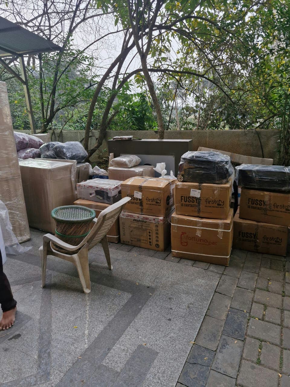 A complete household move, with all furniture and boxes packed and organized for loading.